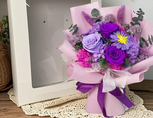 Purple preserved rose bouquet with mixed flowers by UKIQUEEN, ideal for wholesale and custom designs.